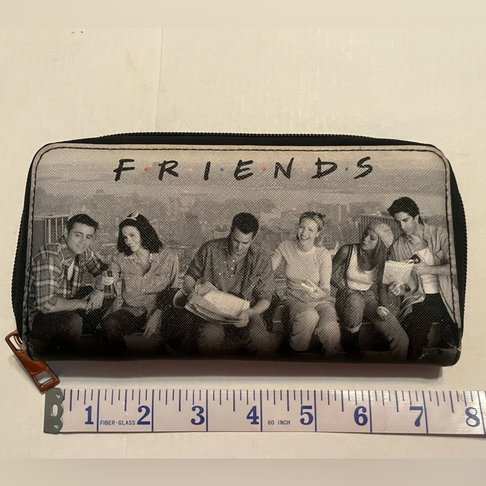 Friends wallet. Plastic like material.